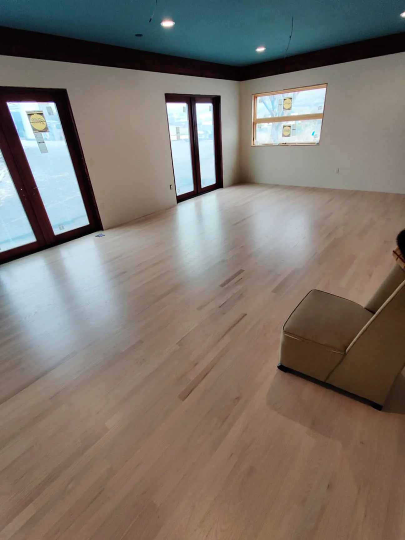 Country White stain over Select Red Oak strip flooring.